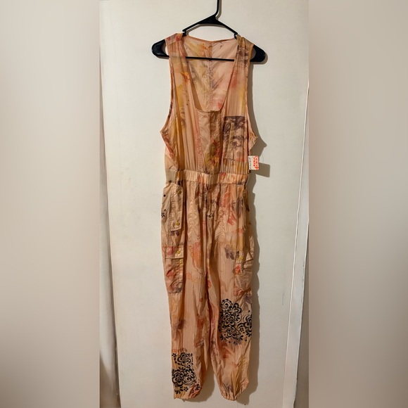 FP Movement by Free People Peach Floral Jumpsuit with Embroidered design. Small - Picture 4 of 14